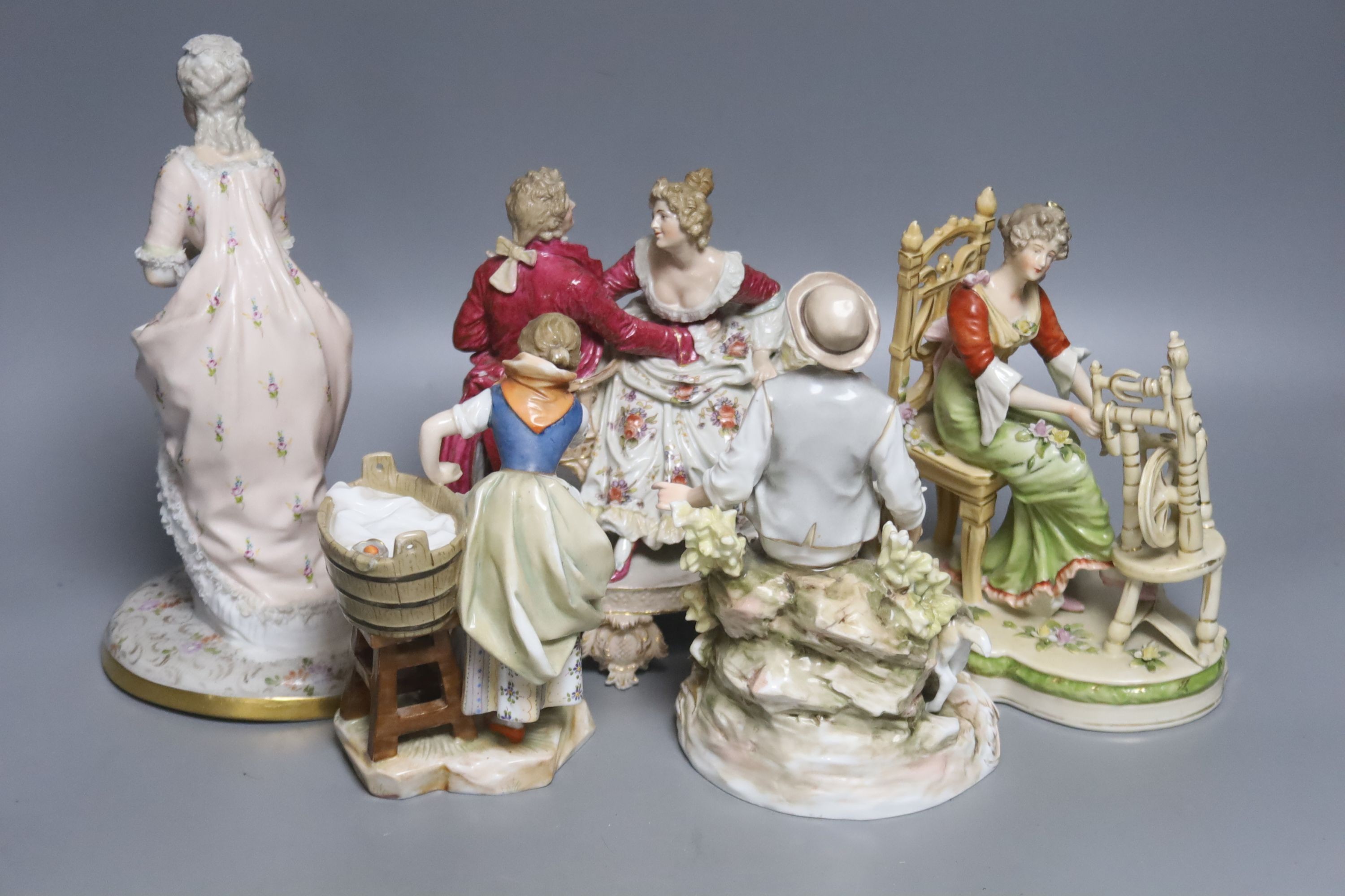 A group of five mixed Continental figures, tallest 22cm